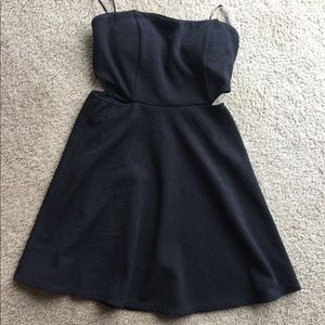 3/$21Adorable straplessmidriff cutouts black dress